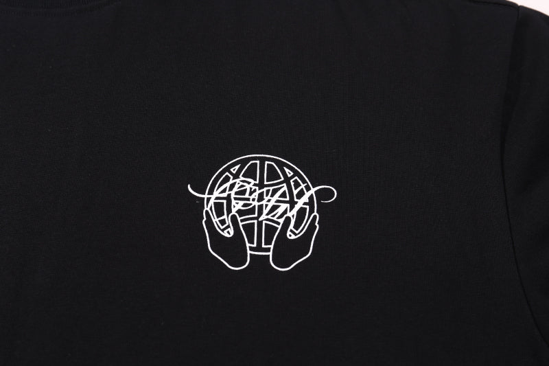 Black T-shirt with small white outline emblem logo on the chest