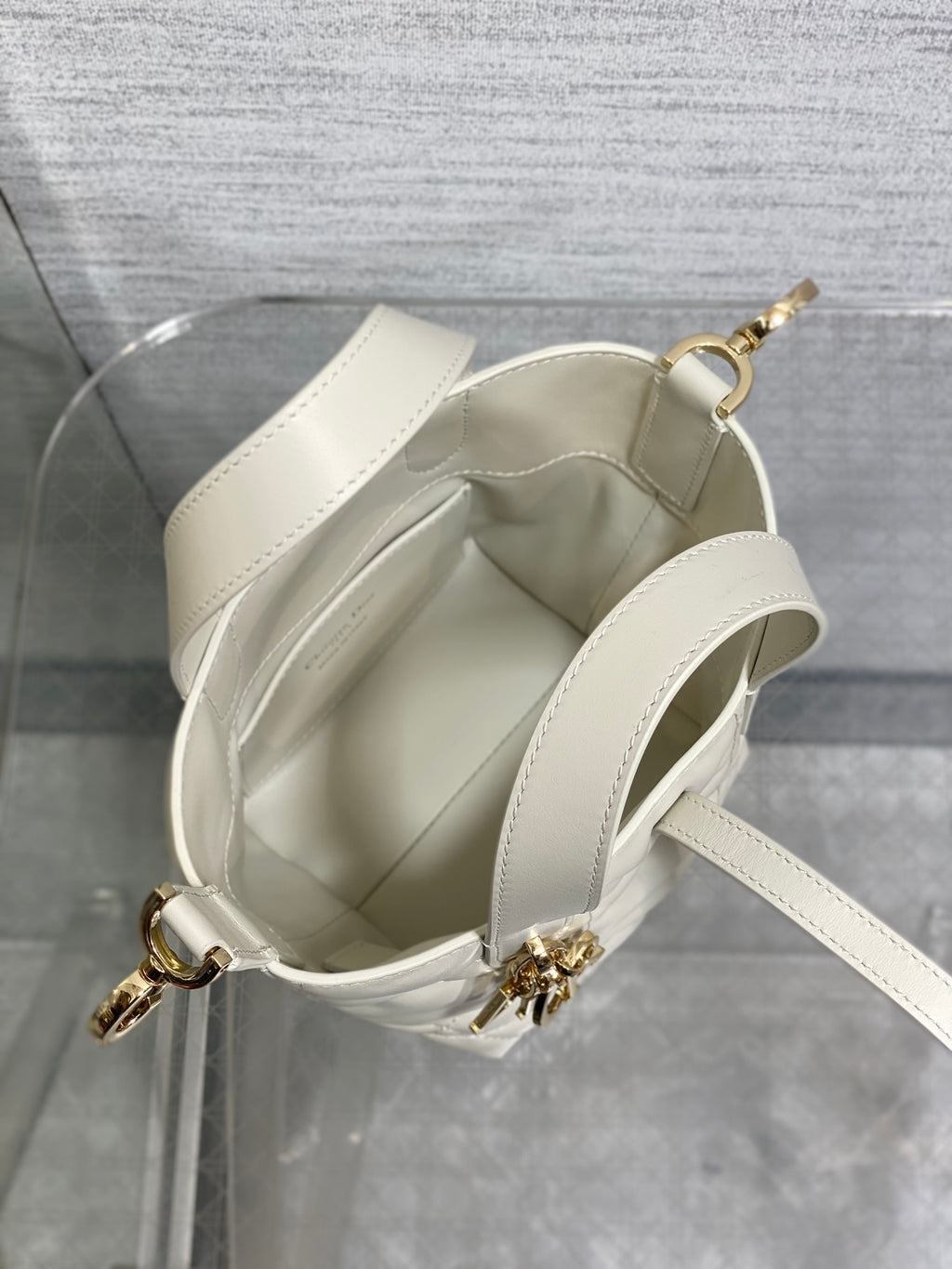 Dior quilted tote bag open top, white leather lining, gold ring hardware, shoulder strap
