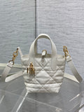Dior quilted tote bag with top handle and shoulder strap, gold hardware, white leather