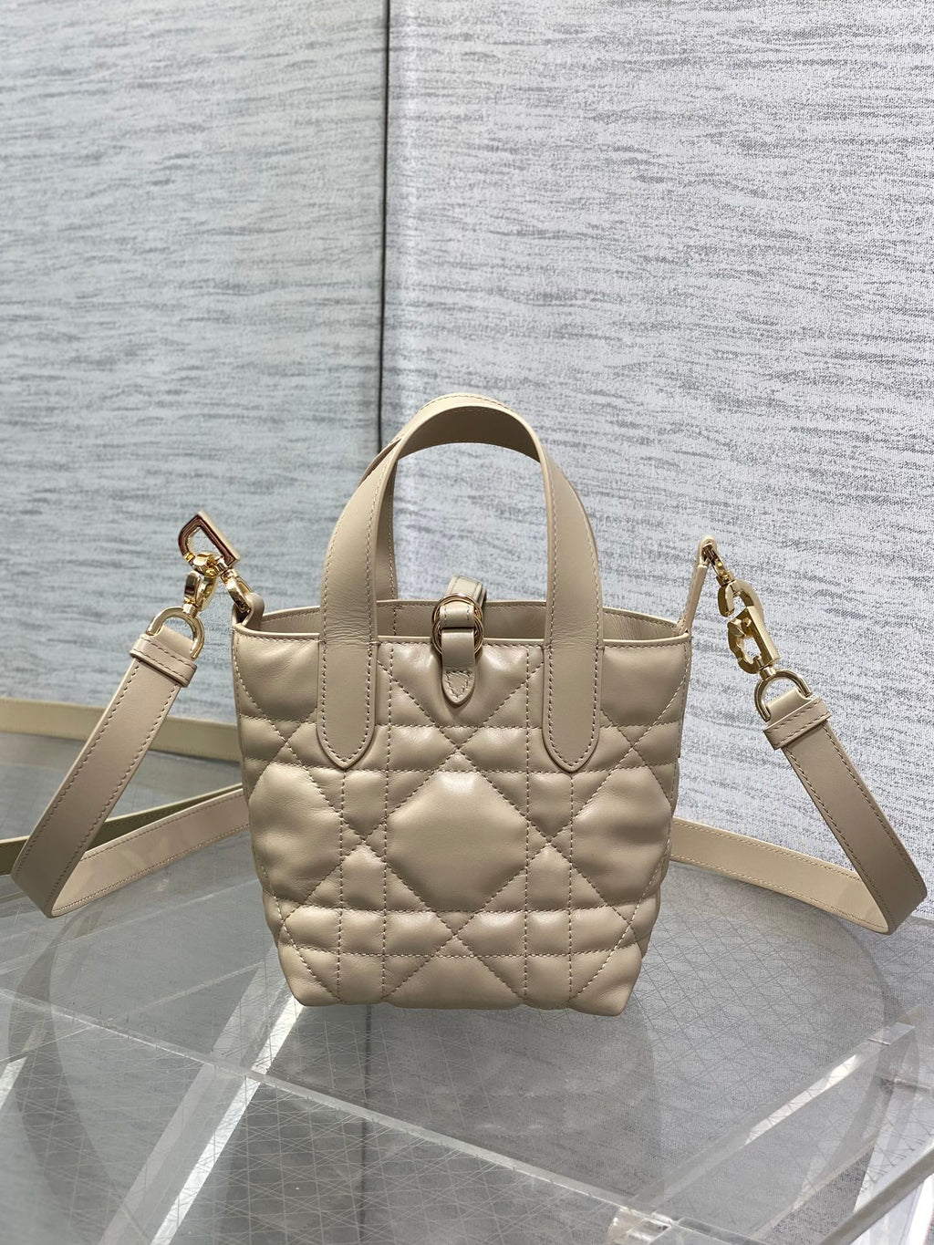 Dior quilted mini handbag with two shoulder straps and gold hardware