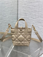 Dior quilted mini handbag with two shoulder straps and gold hardware