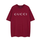 Burgundy Gucci T-shirt with large white GUCCI logo on front
