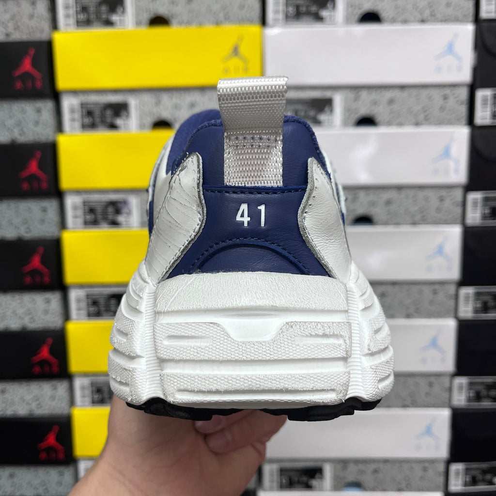 White and blue lace-up sneaker heel with pull tab and strap