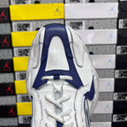 White and blue lace-up sneaker tongue and laces detail