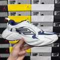 White and blue lace-up sneaker with chunky ridged sole