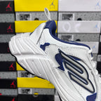 White and blue lace-up sneaker, front-quarter view, chunky ridged sole