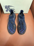 Burberry blue knit sneakers with yellow accents and lace-up design