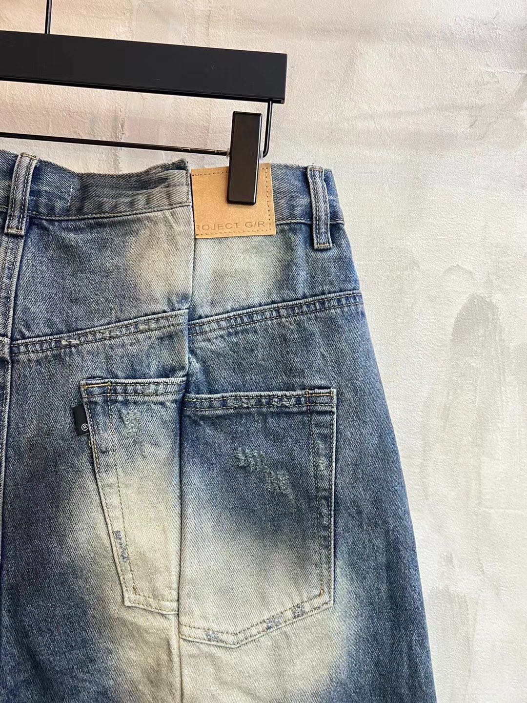 Blue denim shorts back/side view with double patch pockets and drawstring waist