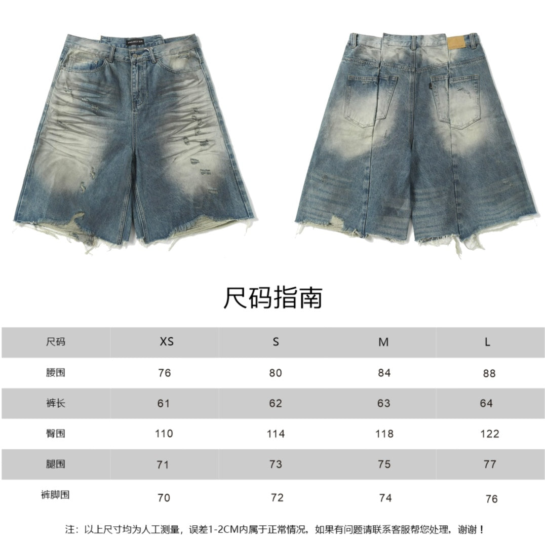 Pair of blue denim shorts with wash pattern and size guide chart below