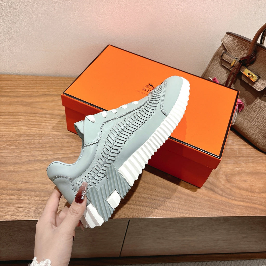 Hermes unisex light blue sneaker upper with white laces and ribbed design
