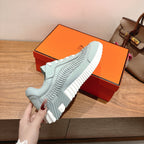 Hermes unisex light blue sneaker upper with white laces and ribbed design