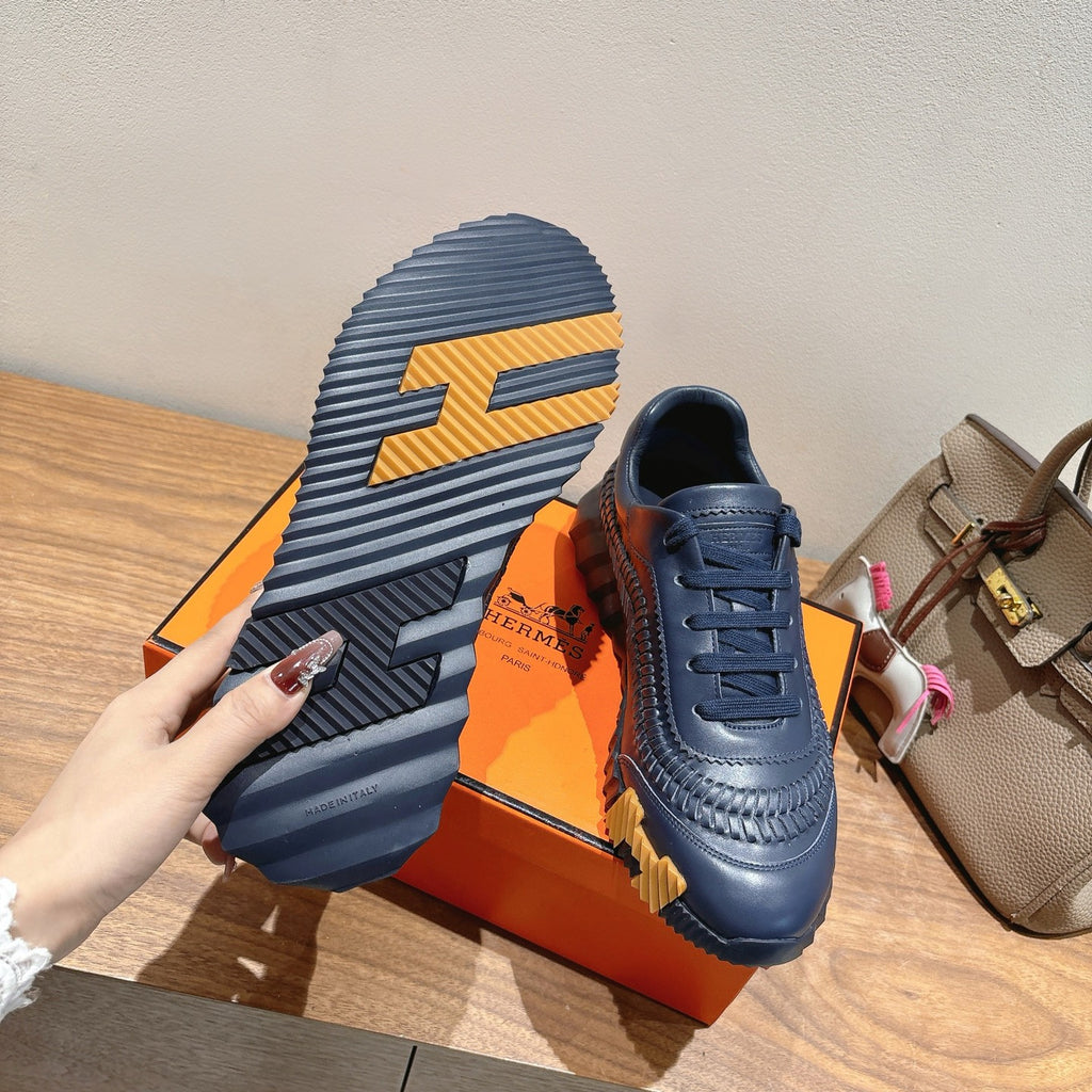 Hermes unisex dark blue sneakers, lace-up upper with visible treaded outsole