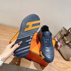 Hermes unisex dark blue sneakers, lace-up upper with visible treaded outsole