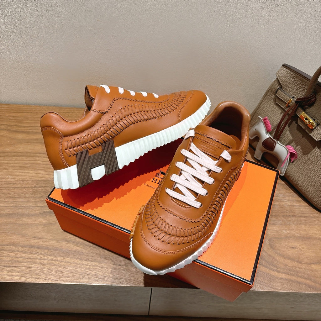 Hermes unisex leather sneakers, tan upper with white laces and thick white tread sole