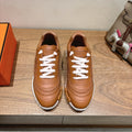 Hermes unisex leather sneakers, tan/brown with white laces and ridged white sole