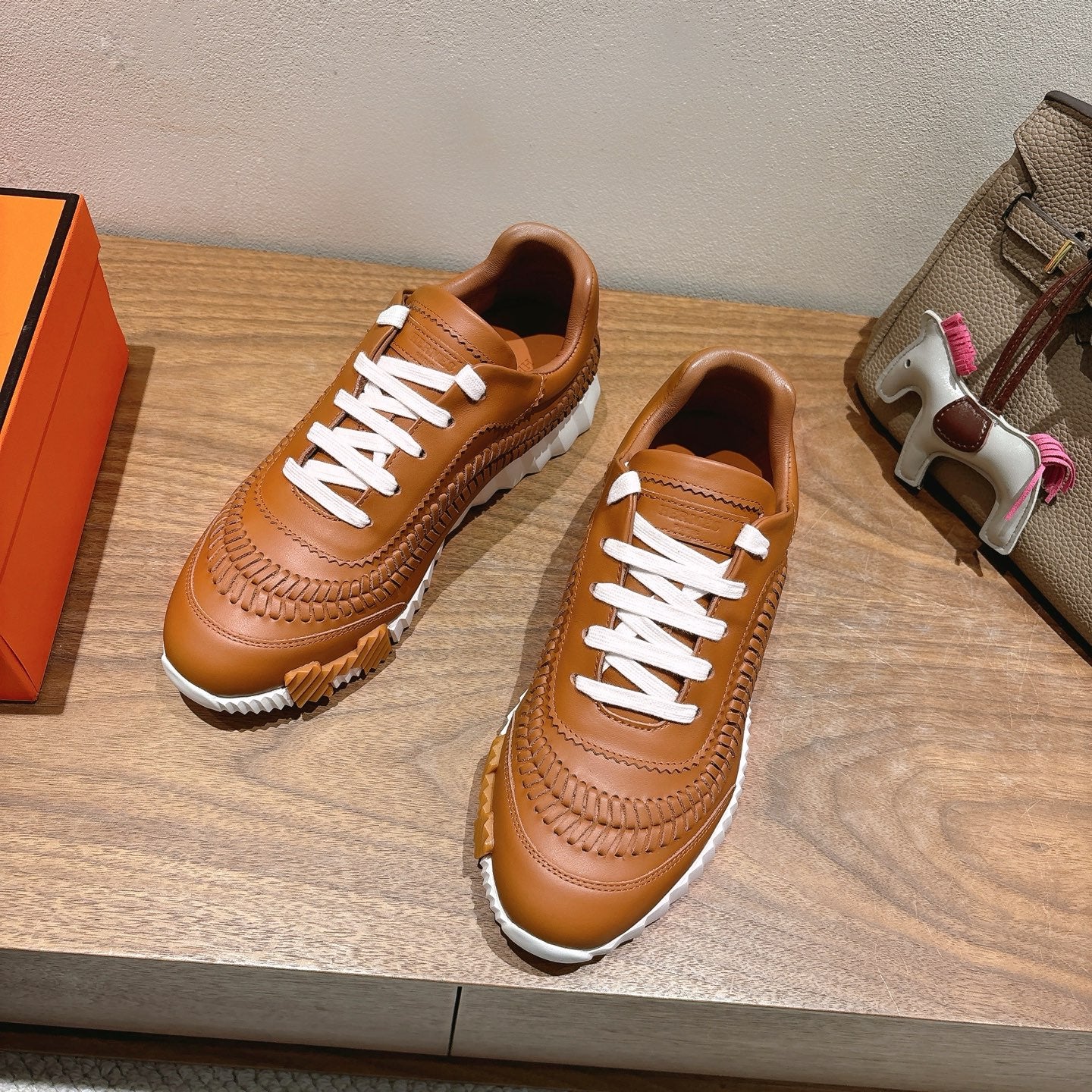 Hermes unisex leather sneakers, tan with white laces and chunky white platform sole