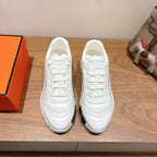 Hermes unisex white lace-up sneakers with ribbed rubber sole