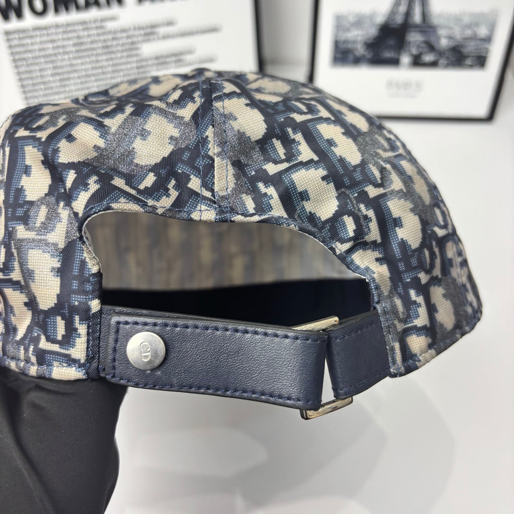 Baseball cap underside view with navy strap and silver snap button