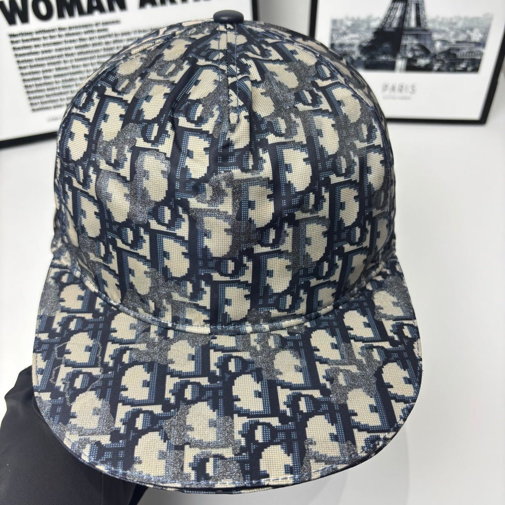 Geometric monogram baseball cap in navy and beige with panel stitching and button