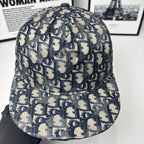 Geometric monogram baseball cap in navy and beige with panel stitching and button