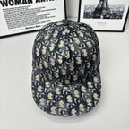 Geometric monogram baseball cap in navy and beige, with adjustable back strap