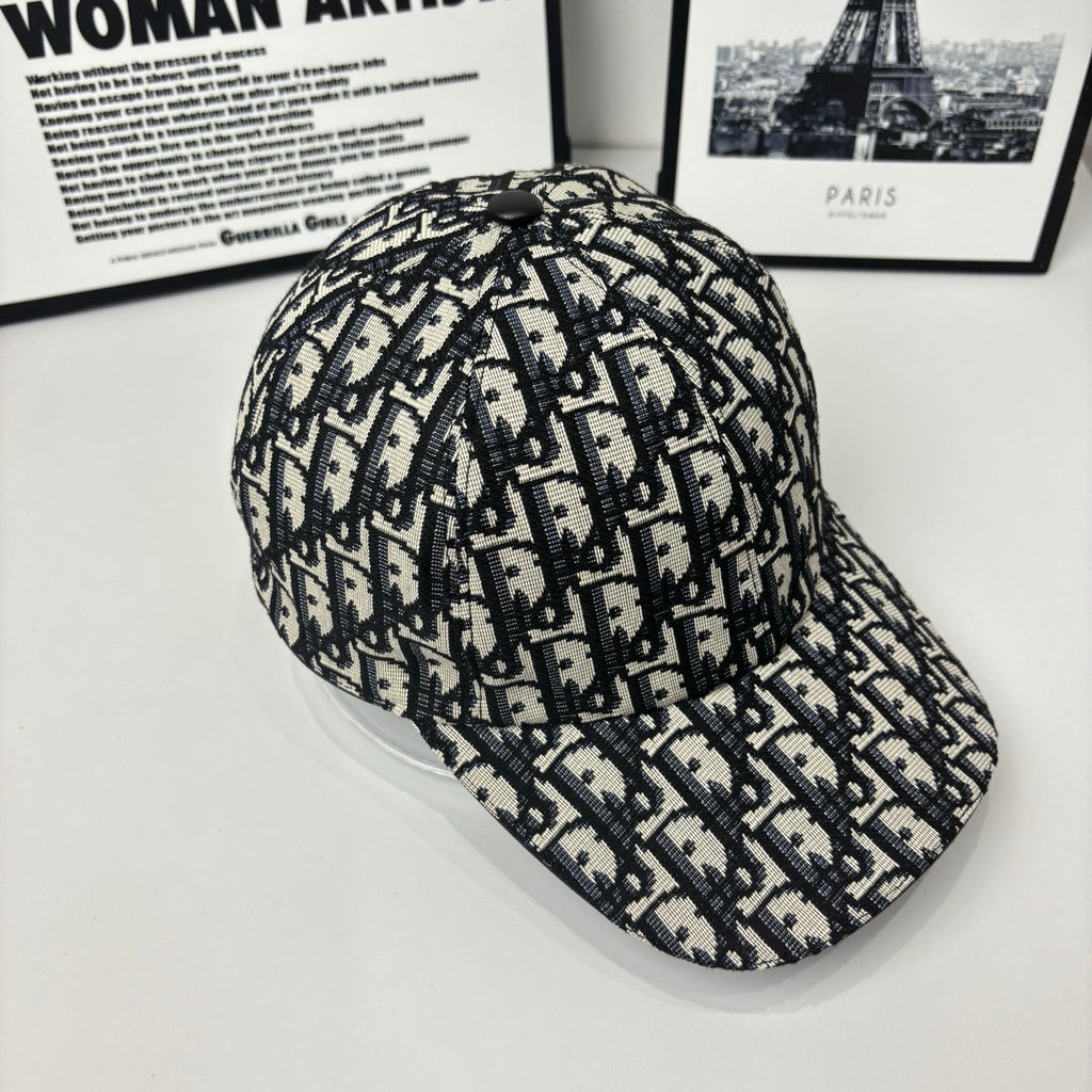Dior baseball cap back view with navy-and-cream Dior monogram pattern, curved brim