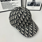 Dior baseball cap back view with navy-and-cream Dior monogram pattern, curved brim