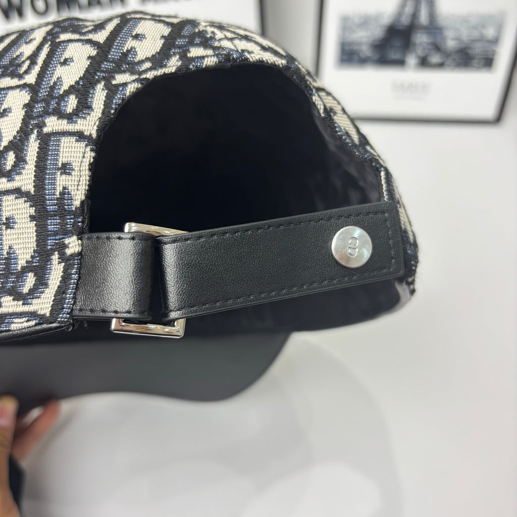 Dior cap interior with black strap and metal buckle at back