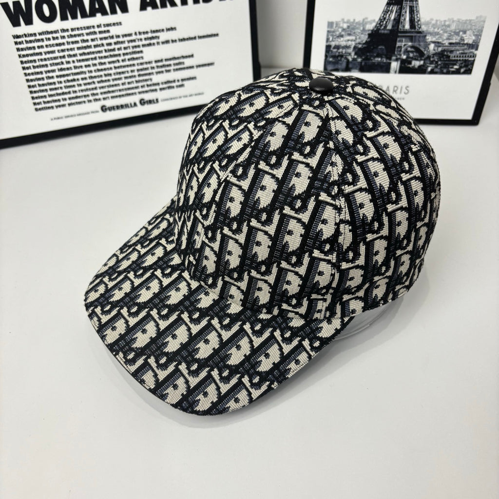 Dior baseball cap side view with navy-and-cream Dior monogram pattern, curved brim