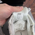 Balenciaga white Runner sneakers, inside label with Puma size 41 and care info