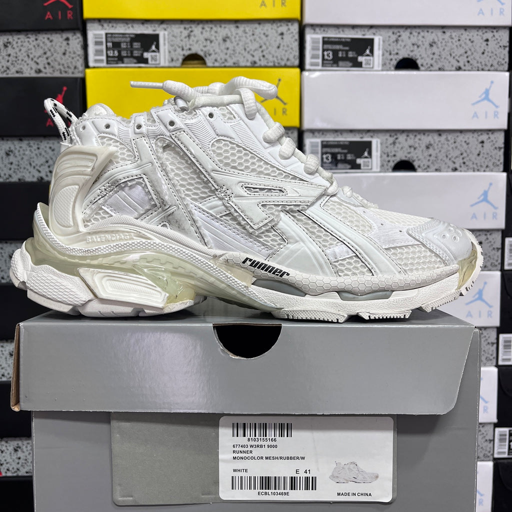 Balenciaga white Runner sneakers with lace-up front and side logo, chunky midsole