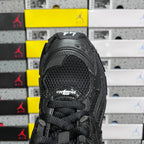 Balenciaga unisex black sneaker toe area with mesh panels and lace opening