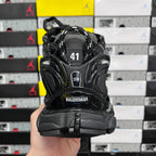Balenciaga unisex black sneaker heel view with size marking and molded heel cap