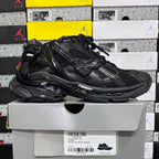 Balenciaga unisex black running sneaker with lace-up and chunky midsole