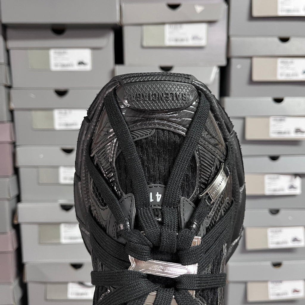 Black Balenciaga unisex sneaker toe and tongue view with woven mesh and laces