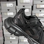 Black Balenciaga unisex sneaker quarter view with textured overlays and lace-up