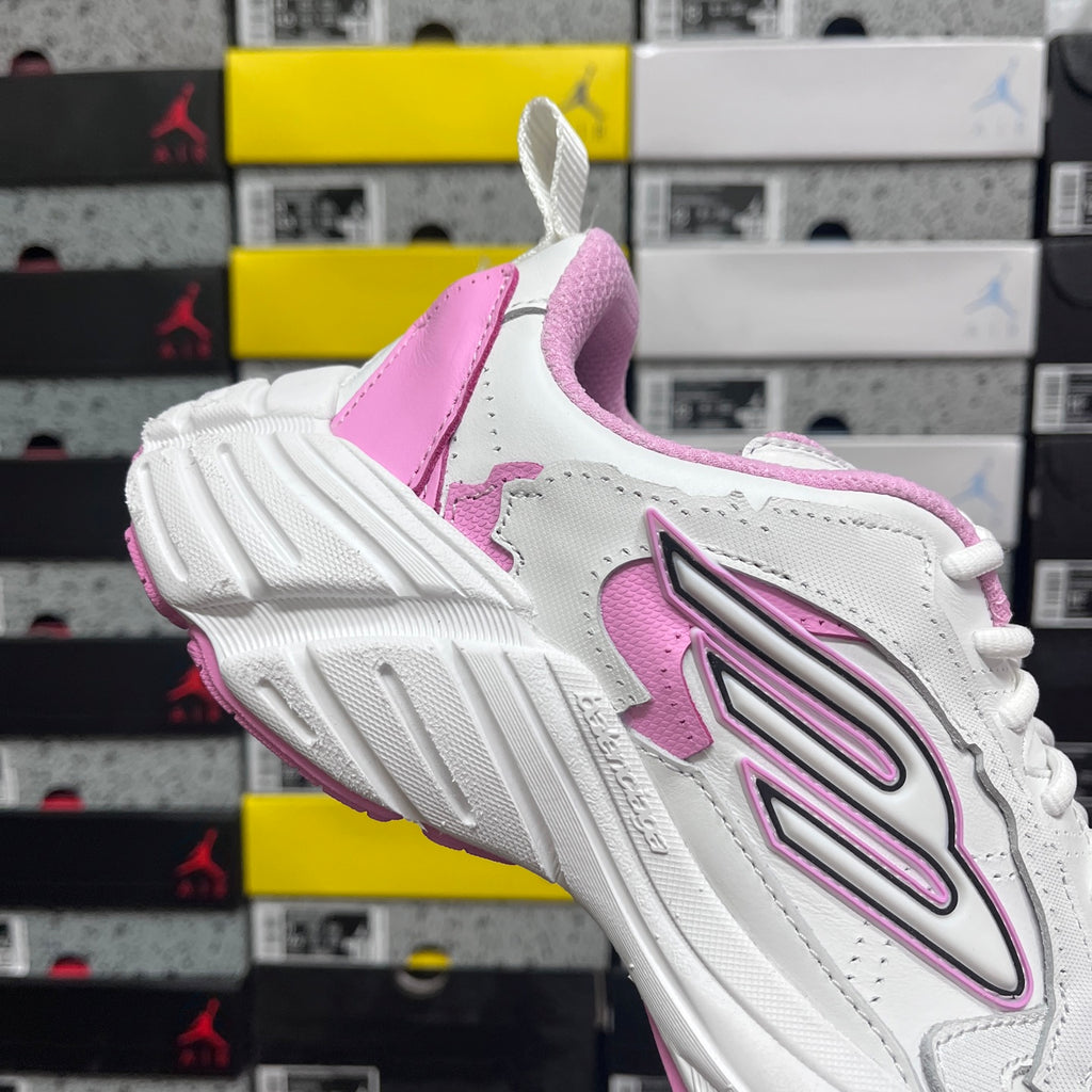 White and pink Balenciaga sneaker with pink heel panel and laces, side emblem visible