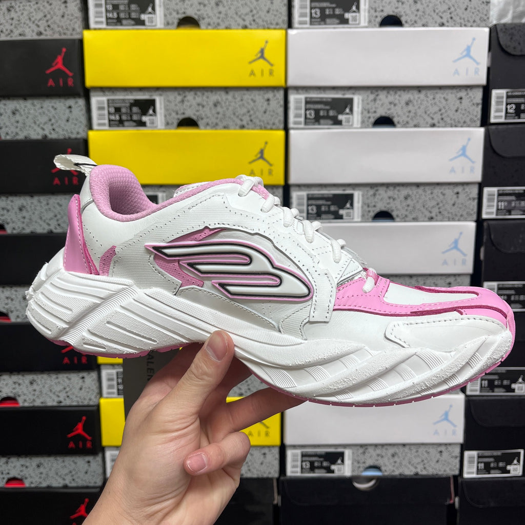 White and pink Balenciaga unisex sneaker front side view with side emblem and laces