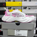 White and pink Balenciaga sneaker side view with oversized side emblem and lace-up