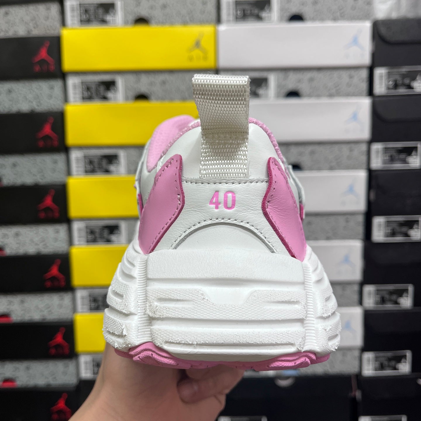White and pink Balenciaga sneaker heel with pink back panel and textured sole tread