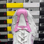 White and pink Balenciaga sneaker rear view with pink padded collar and stitched panel