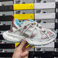 Balenciaga unisex sneaker in white mesh with red accents and light blue collar