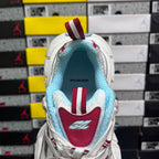 Balenciaga sneaker interior view with light blue collar and red insole patch