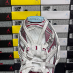 Balenciaga sneaker heel with white mesh, red stripes, and padded light blue lining