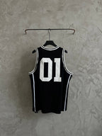 Black basketball jersey with white trim stripes and Balenciaga 01 back graphic