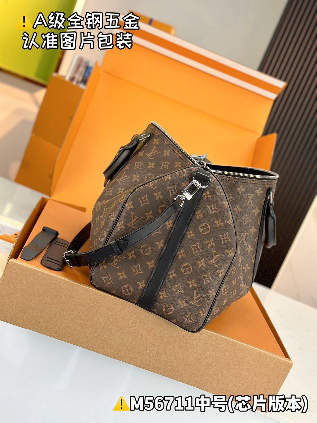 Men's satchel with monogram print, zipper top, and adjustable shoulder strap; structured body.