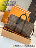 Men's satchel with monogram pattern, top handles, and black shoulder strap; zipper closure.