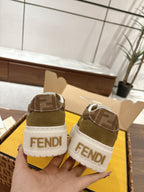 Fendi sneakers heel view showing “FENDI” lettering on white back panels