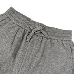 Close-up of gray marl drawstring shorts waistband with gathered elastic and ties