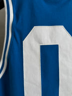 Blue jersey panel with large white number outline and blue inset
